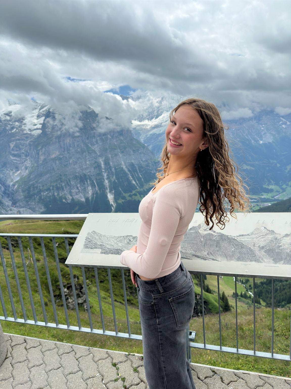 Founder standing in the mountains